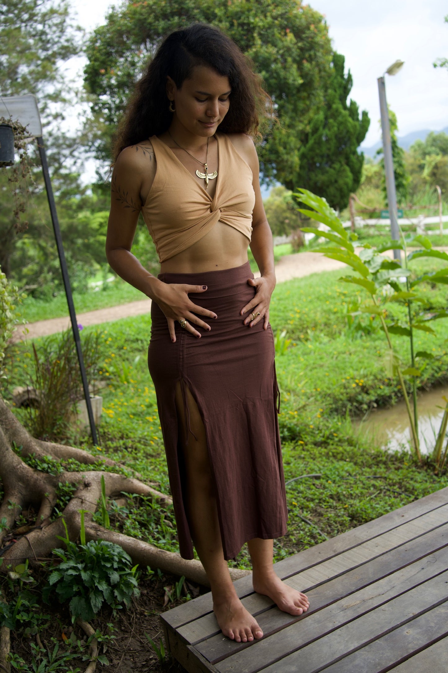 Isis goddess brass pendant