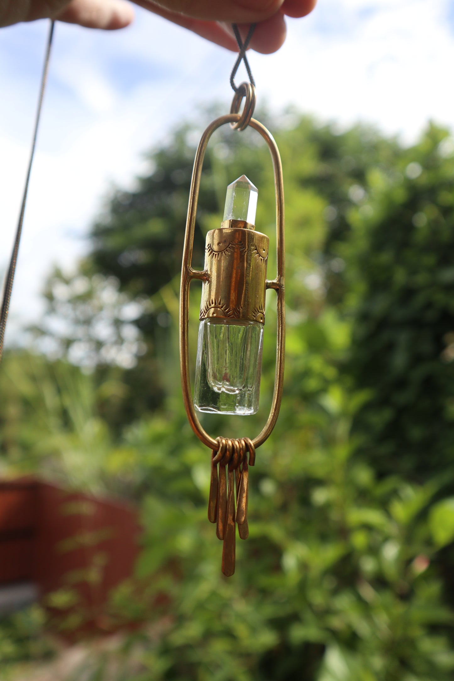 Aurora Vessel Brass Roller Quartz Pendant